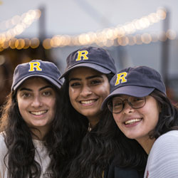 Three 十大赌博正规老平台 sophomores posed together while wearing 十大赌博正规老平台 hats. 